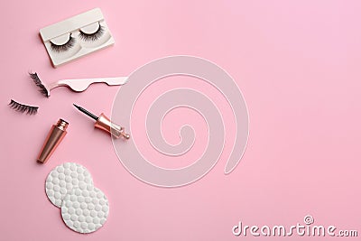 Flat lay composition with magnetic eyelashes and accessories on pink background. Space for text Stock Photo