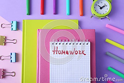 Flat lay composition of notebook with word HOMEWORK on background Stock Photo