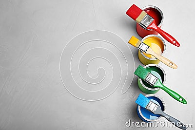 Flat lay composition with paint cans and brushes Stock Photo