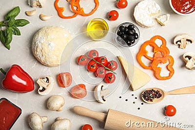 Flat lay composition pizza dough and fresh ingredients Stock Photo