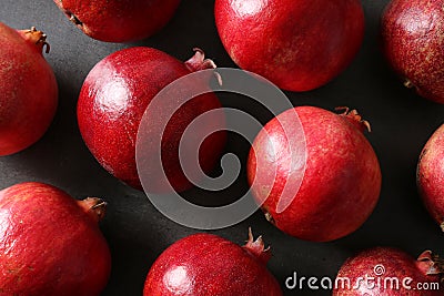 Flat lay composition with pomegranates on grey Stock Photo