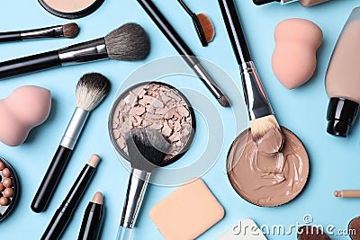 Flat lay composition with skin foundation, powder and beauty accessories Stock Photo