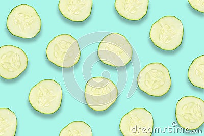 Flat lay composition with slices of cucumber on color blue Stock Photo