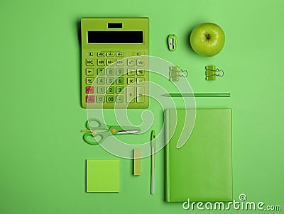 Flat lay composition with stationery, calculator and apple on background Stock Photo