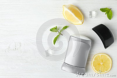 Flat lay composition with stick male deodorant on white wooden table Stock Photo
