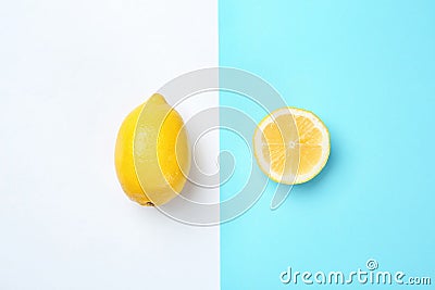 Flat lay composition with whole and sliced lemons Stock Photo