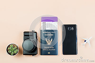 Flat lay and copy space for design work of vintage digital compact camera with Thailand official passport, boarding pass, smart ph Stock Photo