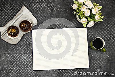 Flat lay desktop, flower`s pot and cup coffee with copy space for your text or design notebook or agenda Stock Photo