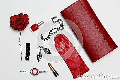 Flat lay feminini red clothes and accessories collage on white background. Stock Photo