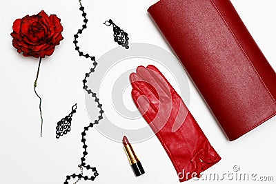 Flat lay feminini red clothes and accessories collage on white background. Stock Photo