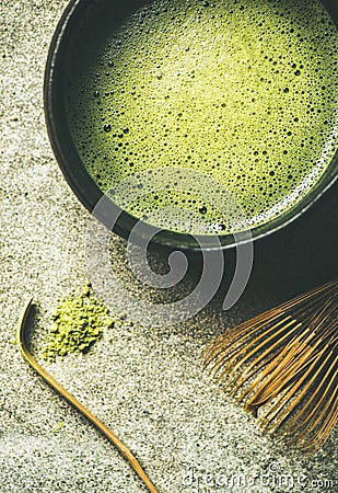 Flat-lay of freshly brewed Japanese matcha tea in Chasen bowl Stock Photo