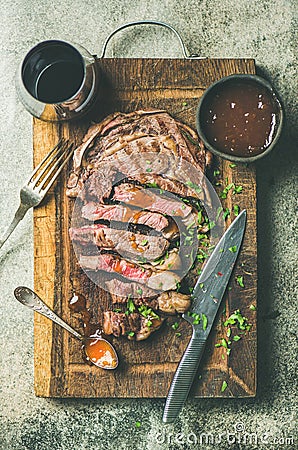 Flat-lay of grilled medium rare ribeye beef steak Stock Photo