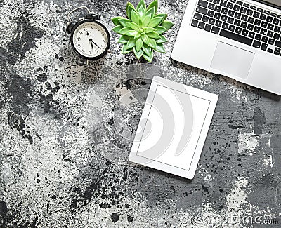 Flat lay mock up Office workplace Laptop tablet clock succulent Stock Photo