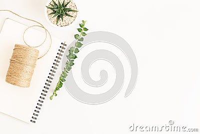 Flat lay photo sack rope on notepad on white background, white copy space for you product Stock Photo