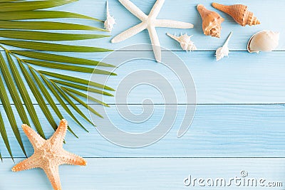 Flat lay photo saeshell and starfish on blue wood table, top view and copy space for montage your product, summer concept Stock Photo