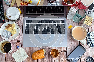 Flat lay of photography equipment on wooden desktop background: dslr camera, laptop and lens. Blogger workspace concept. Top view Editorial Stock Photo