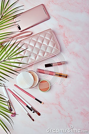 Flat lay with set of decorative cosmetics, makeup tools and feminine accessories Stock Photo