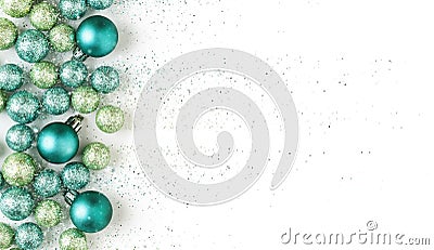 Beautiful, bright, modern, blue and green Christmas holiday ornaments decoration with glitter special effect. Stock Photo