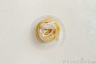 Flat lay top view fettuccine pasta on a white background Stock Photo