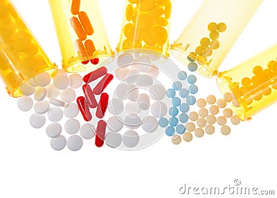 Bottles of pills pouring contents onto white isolated background flat lay Stock Photo