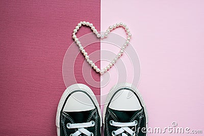 Flat lay Valentines day banner. Chucks and pearls female concept. Stock Photo