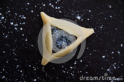 One Hamantash cookie preparation for Purim Jewish holiday Stock Photo