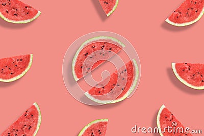 Flat lay of watermelon half slices on pink background. Watermelon pattern Stock Photo