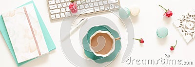 Flat lay women`s office desk banner. Female workspace with laptop, Stock Photo