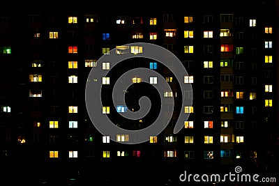Flat night panorama of multicolor light in windows of multistory buildings. life in big city Stock Photo