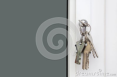 A bunch of iron keys hang on the lock Stock Photo