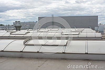 Flat roof with many large skylights and hydro insulation membranes Stock Photo