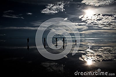 Flat uyuni salt and desert , infinite mirror and water, blue, sunset, landscape, siluettes, storms, beautiful, awesome, paradise, Editorial Stock Photo