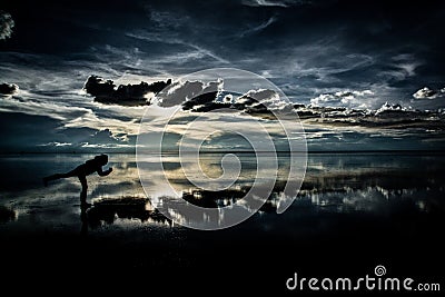 Flat uyuni salt and desert , infinite mirror and water, blue, sunset, landscape, siluettes, storms, beautiful, awesome, paradise, Editorial Stock Photo