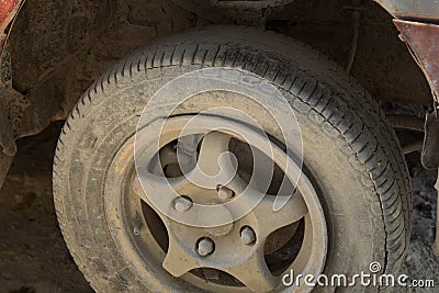 Flate tyre on car wheel Stock Photo