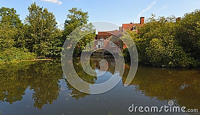 Flatford Mill at Dedham Suffolk with water and trees Stock Photo