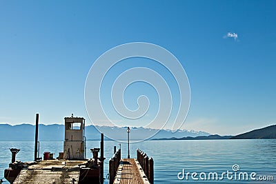 Flathead Lake Dock w/ Barge Stock Photo