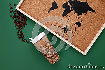 Flatlay coffee cup with coffee beans on green background Stock Photo