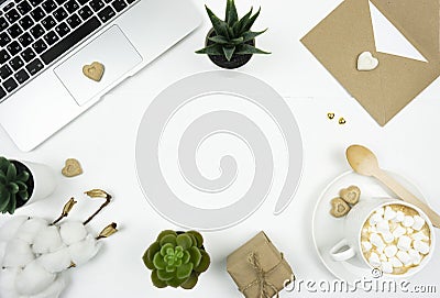 Flatlay of the cup of cappuccino, laptop, branch of cotton, loverâ€™s letter, brown sugar and succulents. Editorial Stock Photo