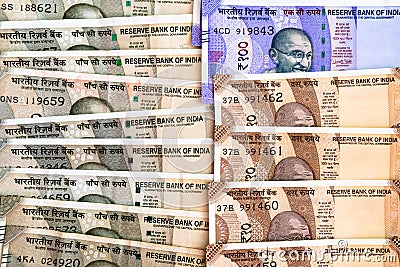 Flatlay of indian currency notes of various denominations placed in a haphazard way showing commerce, business, earning Stock Photo