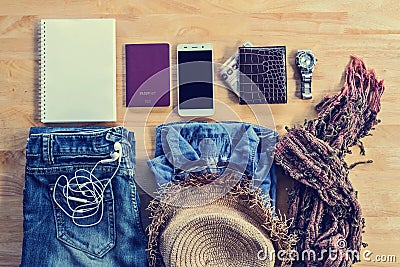 Flatlay Travel accessories and costume on wooden Stock Photo