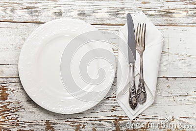 Flatware on wooden table Stock Photo