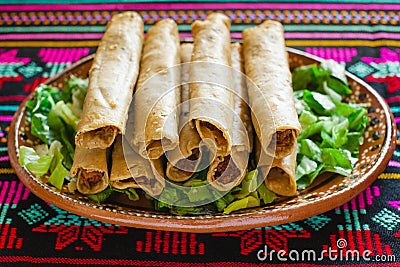 Flautas de pollo tacos and Salsa Homemade food Mexican mexico city Stock Photo