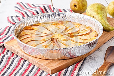 Flavorous rustic open pie pear cheese cinnamon and almond Stock Photo