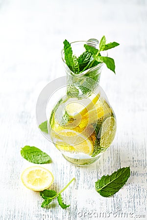 Flavoured Water with Lime, Lemon and Mint Leaves Stock Photo