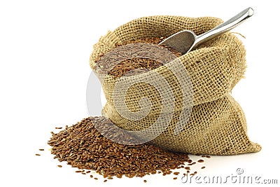 Flax seed (linseed) in a burlap bag Stock Photo