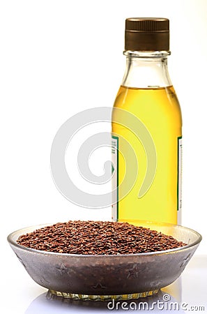 Flax seeds and oil Stock Photo