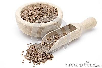 Flaxseeds in wooden scoop and bowl Stock Photo