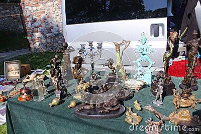 Flea market - statues and other decorations sold there as antiques or curiosities Editorial Stock Photo