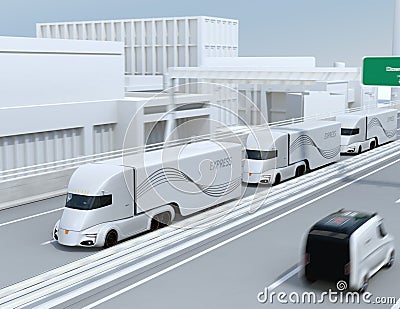 A fleet of self-driving electric semi trucks driving on highway Stock Photo