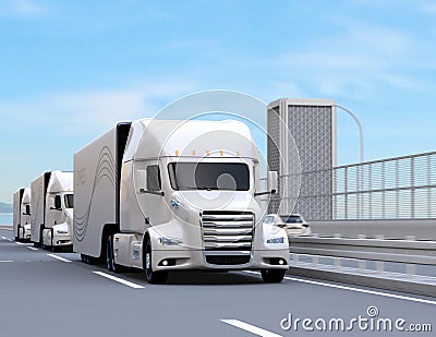 A fleet of white self-driving Fuel Cell Powered American Trucks driving on highway Stock Photo